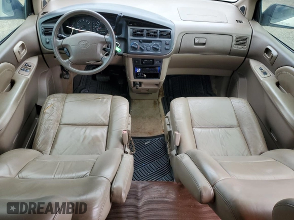1999 Toyota Sienna LE with VIN 4T3ZF13C4XU134680, listed as a Copart auction lot 74044544 with 127,954 mi miles and Clean Title. Bid and sale history available at carsss.com. Image 8.