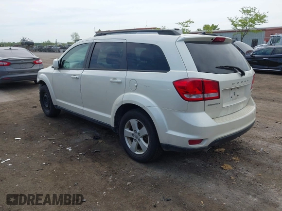 2012 Dodge Journey SXT with VIN 3C4PDCBG4CT372642, listed as a IAAI auction lot 42238499 with 172,033 mi miles and . Bid and sale history available at DreamBid. Image 3.