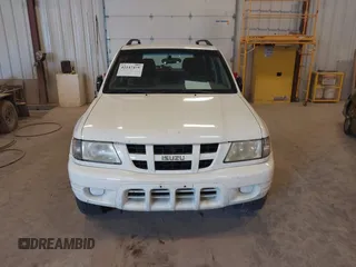 2004 Isuzu Rodeo S with VIN 4S2CK58W244313115, listed as a IAAI auction lot 42147475 with 186,594 mi miles and . Bid and sale history available at DreamBid. Image 6.