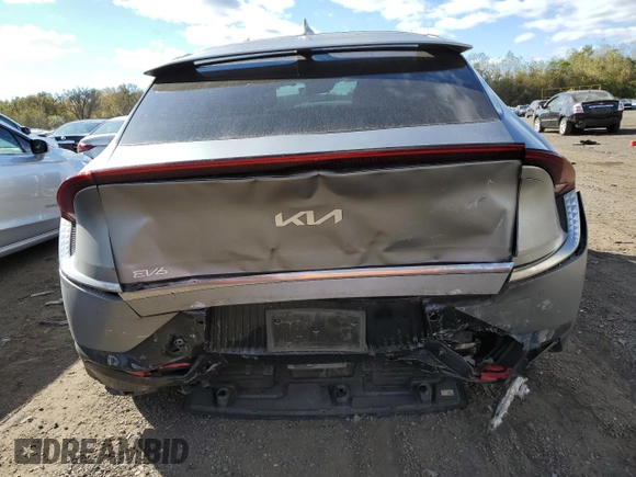 2022 Kia EV6 GT-Line with VIN KNDC3DLC2N5027633, listed as a Copart auction lot 76138314 with 64,558 mi miles and Salvage Title. Bid and sale history available at carsss.com. Image 6.