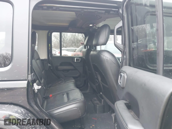 2018 Jeep Wrangler Unlimited Sahara z VIN 1C4HJXEN6JW332956, wystawiony jako IAAI lot #41477681 z przebiegiem 97 446 mil mil oraz . Historia ofert i sprzedaży dostępna na DreamBid. Obrazek 8.