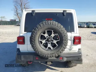 2018 Jeep Wrangler Unlimited Rubicon с VIN 1C4HJXFGXJW210780, выставлен на аукционе Copart как лот 50590655 с пробегом 98 416 миль миль и Списание • Salvage title. История ставок и продаж доступна на DreamBid. Изображение 6.
