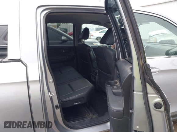 2018 Honda Ridgeline RTL with VIN 5FPYK3F52JB002649, listed as a IAAI auction lot 42338360 with 68,802 mi miles and . Bid and sale history available at DreamBid. Image 8.