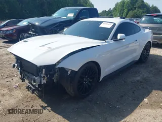 2021 Ford Mustang EcoBoost with VIN 1FA6P8TH6M5155737, listed as a IAAI auction lot 42389839 with 39,754 mi miles and . Bid and sale history available at DreamBid. Image 2.