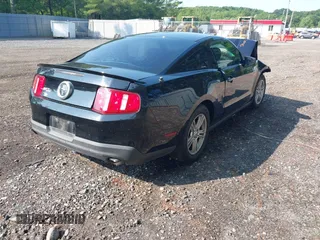 2012 Ford Mustang Premium with VIN 1ZVBP8AM1C5288023, listed as a IAAI auction lot 42486009 with 143,525 mi miles and . Bid and sale history available at DreamBid. Image 4.