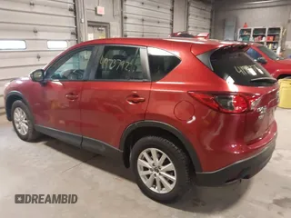 2013 Mazda CX-5 Touring with VIN JM3KE4CEXD0120913, listed as a IAAI auction lot 41973792 with 129,202 mi miles. Bid and sale history available at carsss.com. Image 3.