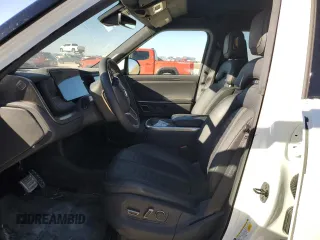 2023 Rivian R1S Adventure with VIN 7PDSGBBA4PN022157, listed as a Copart auction lot 81359984 with 13,522 mi miles and Salvage Title. Bid and sale history available at DreamBid. Image 7.