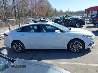 2018 Ford Fusion Titanium with VIN 3FA6P0D93JR162212, listed as a IAAI auction lot 41767723 with 134,010 mi miles and . Bid and sale history available at DreamBid. Image 13.