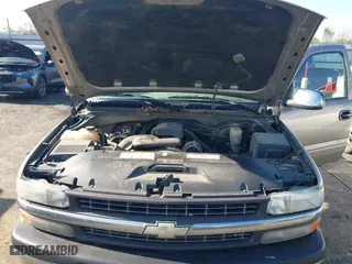 1999 Chevrolet Silverado 1500 LS with VIN 2GCEC19T0X1205414, listed as a IAAI auction lot 41971238 with 208,712 mi miles. Bid and sale history available at carsss.com. Image 10.