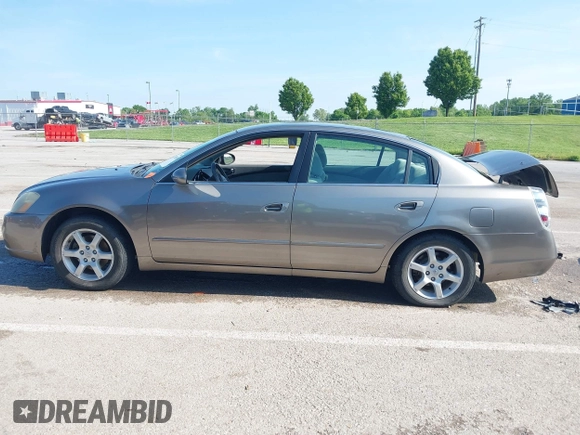 2005 Nissan Altima S z VIN 1N4AL11D05C281697, wystawiony jako IAAI lot #42220810 z przebiegiem 104 047 mil mil oraz . Historia ofert i sprzedaży dostępna na DreamBid. Obrazek 14.