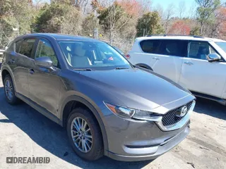 2017 Mazda CX-5 Touring with VIN JM3KFBCL2H0203497, listed as a IAAI auction lot 41860782 with 65,482 mi miles. Bid and sale history available at carsss.com. Image 1.