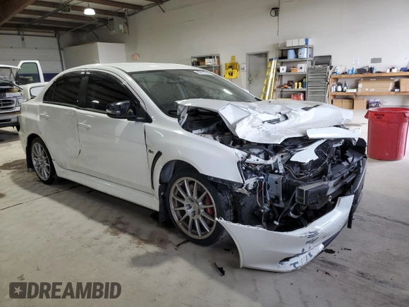 2015 Mitsubishi Lancer Evolution GSR with VIN JA32W8FV0FU016272, listed as a Copart auction lot 50517395 with 89,318 mi miles and Salvage Title. Bid and sale history available at carsss.com. Image 4.