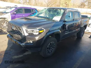 2023 Toyota Tacoma SR with VIN 3TMCZ5AN2PM553928, listed as a IAAI auction lot 40999044 with 9,210 mi miles and . Bid and sale history available at DreamBid. Image 17.