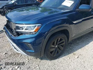 2022 Volkswagen Atlas SE z VIN 1V2HE2CA7NC211835, wystawiony jako IAAI lot #42722660 z przebiegiem 56 112 mil mil oraz . Historia ofert i sprzedaży dostępna na DreamBid. Obrazek 19.