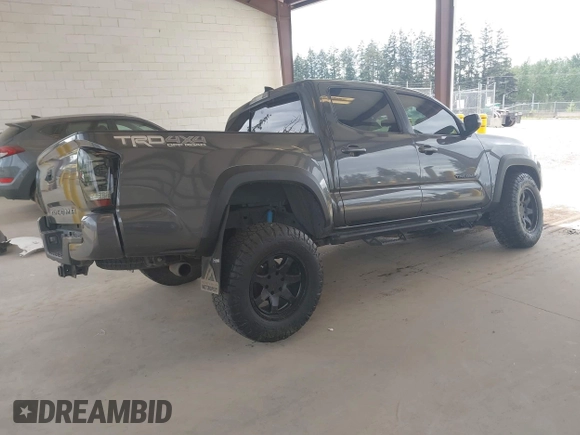 2019 Toyota Tacoma SR z VIN 3TMCZ5AN1KM257081, wystawiony jako IAAI lot #42211385 z przebiegiem 60 229 mil mil oraz . Historia ofert i sprzedaży dostępna na DreamBid. Obrazek 4.