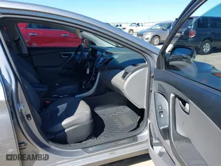 2014 Hyundai Elantra SE with VIN KMHDH4AE7EU032788, listed as a IAAI auction lot 41638876 with 135,943 mi miles. Bid and sale history available at carsss.com. Image 5.