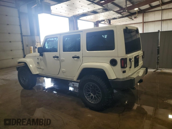 2015 Jeep Wrangler Unlimited Sahara с VIN 1C4HJWEG0FL560973, выставлен на аукционе Copart как лот 59552135 с пробегом 135 057 миль миль и Чистый • Clean title. История ставок и продаж доступна на DreamBid. Изображение 2.