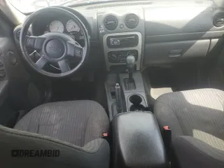 2003 Jeep Liberty Sport z VIN 1J4GK48K43W657028, wystawiony jako Copart lot #55070315 z przebiegiem 243 019 mil mil oraz Szkody całkowita. Historia ofert i sprzedaży dostępna na DreamBid. Obrazek 8.