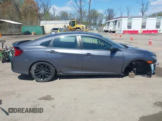 2020 Honda Civic Si z VIN 2HGFC1E53LH704576, wystawiony jako IAAI lot #41979301 z przebiegiem 59 245 mil mil oraz . Historia ofert i sprzedaży dostępna na DreamBid. Obrazek 14.