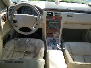 1998 Mercedes-Benz E-Class with VIN WDBJH82FXWX013155, listed as a Copart auction lot 68515674 with 223,294 mi miles and Salvage Title. Bid and sale history available at carsss.com. Image 8.