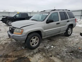 2000 Jeep Grand Cherokee Laredo z VIN 1J4GW48S8YC335926, wystawiony jako Copart lot #80693454 z przebiegiem 353 635 mil mil oraz Nie do naprawy • Non repairable. Historia ofert i sprzedaży dostępna na DreamBid. Obrazek 1.