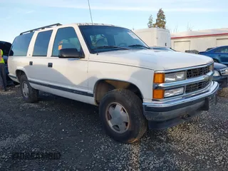 1997 Chevrolet Suburban with VIN 3GNFK16RXVG102805, listed as a IAAI auction lot 41559415 with 1 mi miles. Bid and sale history available at carsss.com. Image 1.
