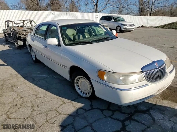 2000 Lincoln Town Car Executive with VIN 1LNHM81W3YY887532, listed as a Copart auction lot 83570574 with 164,105 mi miles and Salvage Title. Bid and sale history available at carsss.com. Image 11.