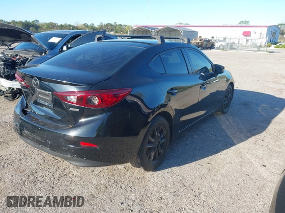 2015 Mazda Mazda3 i Touring with VIN 3MZBM1V73FM207770, listed as a IAAI auction lot 41749926 with 106,522 mi miles. Bid and sale history available at carsss.com. Image 4.