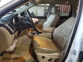 2017 Jeep Grand Cherokee Overland with VIN 1C4RJECG9HC965752, listed as a Copart auction lot 83874784 with 106,604 mi miles and Salvage Title. Bid and sale history available at carsss.com. Image 7.