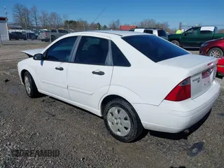 2007 Ford Focus S z VIN 1FAFP34N37W319953, wystawiony jako IAAI lot #41737822 z przebiegiem 208 801 mil mil oraz . Historia ofert i sprzedaży dostępna na DreamBid. Obrazek 3.