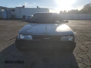 1988 Toyota Corolla z VIN JT2AE92E9J3106720, wystawiony jako Copart lot #78470924 z przebiegiem 161 927 mil mil oraz Szkoda całkowita • Salvage title. Historia ofert i sprzedaży dostępna na DreamBid. Obrazek 5.
