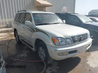2000 Lexus LX with VIN JT6HT00W5Y0080249, listed as a IAAI auction lot 41726247 with 315,707 mi miles. Bid and sale history available at carsss.com. Image 1.