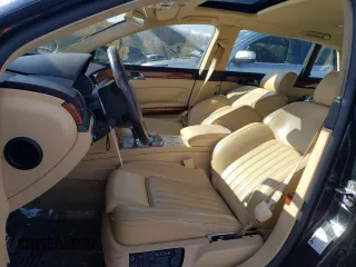 2004 Volkswagen Phaeton V8 z VIN WVWAF63D048011494, wystawiony jako Copart lot #43921145 z przebiegiem 129 758 mil mil oraz Tytuł czysty. Historia ofert i sprzedaży dostępna na DreamBid. Obrazek 7.
