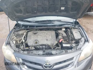 2011 Toyota Corolla L with VIN 2T1BU4EE6BC679516, listed as a IAAI auction lot 42104879 with 184,014 mi miles. Bid and sale history available at carsss.com. Image 10.