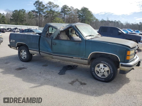 1995 GMC Sierra 1500 z VIN 2GTEK19K1S1561454, wystawiony jako Copart lot #47128465 z przebiegiem 178 963 mil mil oraz Szkody całkowita. Historia ofert i sprzedaży dostępna na DreamBid. Obrazek 4.