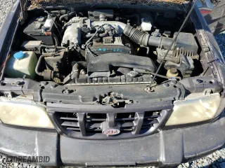 2000 Kia Sportage with VIN KNDJB7237Y5683960, listed as a Copart auction lot 75192944 with 127,615 mi miles and Salvage Title. Bid and sale history available at carsss.com. Image 12.