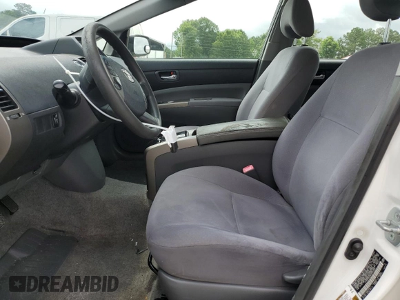 2006 Toyota Prius z VIN JTDKB20U867527026, wystawiony jako Copart lot #59057765 z przebiegiem 248 523 mil mil oraz Nie do naprawy • Non repairable. Historia ofert i sprzedaży dostępna na DreamBid. Obrazek 7.