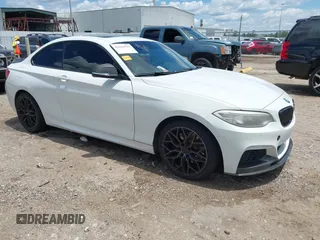 2014 BMW 2 Series 228i with VIN WBA1F5C54EV256303, listed as a IAAI auction lot 42214512 with 81,116 mi miles and . Bid and sale history available at DreamBid. Image 1.