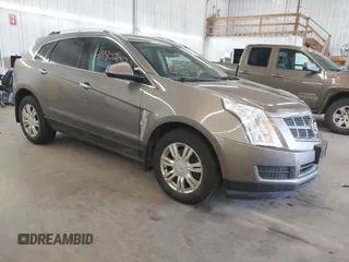 2011 Cadillac SRX Luxury Collection z VIN 3GYFNDEY0BS610259, wystawiony jako IAAI lot #41880242 z przebiegiem 144 631 mil mil oraz . Historia ofert i sprzedaży dostępna na DreamBid. Obrazek 1.