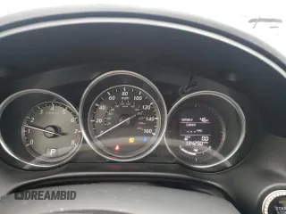 2013 Mazda CX-5 Grand Touring with VIN JM3KE4DE8D0161586, listed as a Copart auction lot 52641145 with 134,290 mi miles and Salvage Title. Bid and sale history available at carsss.com. Image 9.