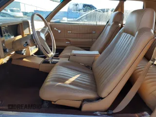 1980 Chevrolet Monte Carlo z VIN 1Z37JAK426238, wystawiony jako Copart lot #81358484 z przebiegiem 55 341 mil mil oraz Szkoda całkowita • Salvage title. Historia ofert i sprzedaży dostępna na DreamBid. Obrazek 7.