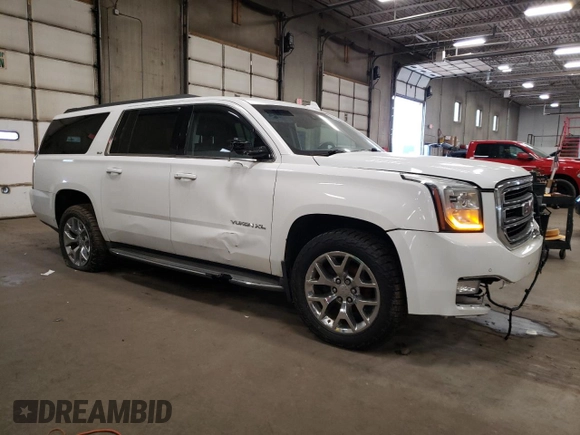 2015 GMC Yukon XL SLT z VIN 1GKS2HKC4FR545409, wystawiony jako Copart lot #55401425 z przebiegiem 214 848 mil mil oraz Czysty tytuł • Clean title. Historia ofert i sprzedaży dostępna na DreamBid. Obrazek 4.