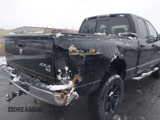 2006 Dodge 1500 SLT with VIN 1D7HU18256J142677, listed as a IAAI auction lot 41159900 with 236,662 mi miles. Bid and sale history available at carsss.com. Image 6.