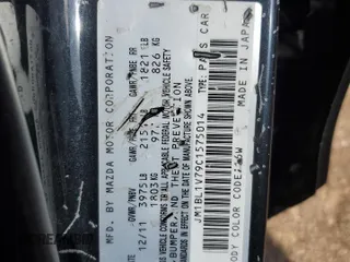 2012 Mazda 3 i Touring with VIN JM1BL1V79C1575014, listed as a Copart auction lot 48743455 with 176,979 mi miles and Salvage Title. Bid and sale history available at DreamBid. Image 12.