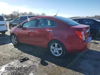 2012 Chevrolet Sonic LTZ z VIN 1G1JE5SHXC4126894, wystawiony jako Copart lot #45186475 z przebiegiem 76 461 mil mil oraz Czysty tytuł • Clean title. Historia ofert i sprzedaży dostępna na DreamBid. Obrazek 2.