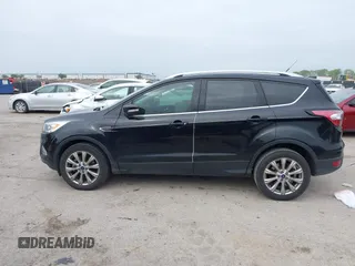 2017 Ford Escape Titanium with VIN 1FMCU0J93HUF10664, listed as a IAAI auction lot 41921588 with 88,377 mi miles. Bid and sale history available at carsss.com. Image 14.