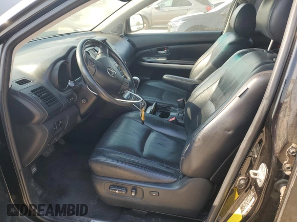 2006 Lexus RX 400h with VIN JTJHW31UX60001795, listed as a Copart auction lot 64407255 with 163,818 mi miles and Salvage title. Bid and sale history available at DreamBid. Image 7.