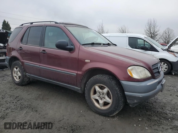 1998 Mercedes-Benz M-Class with VIN 4JGAB54E4WA028593, listed as a Copart auction lot 88130125 with 200,823 mi miles and Clean Title. Bid and sale history available at carsss.com. Image 4.
