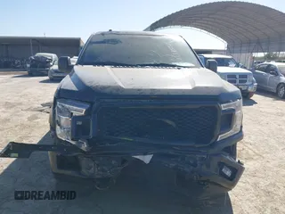 2018 Ford F-150 XL with VIN 1FTEW1E50JKE13640, listed as a IAAI auction lot 41228537 with 146,927 mi miles. Bid and sale history available at carsss.com. Image 12.