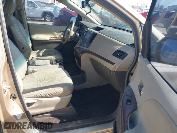2011 Toyota Sienna XLE AAS with VIN 5TDYK3DC4BS013644, listed as a IAAI auction lot 41905759 with 208,800 mi miles and . Bid and sale history available at DreamBid. Image 5.